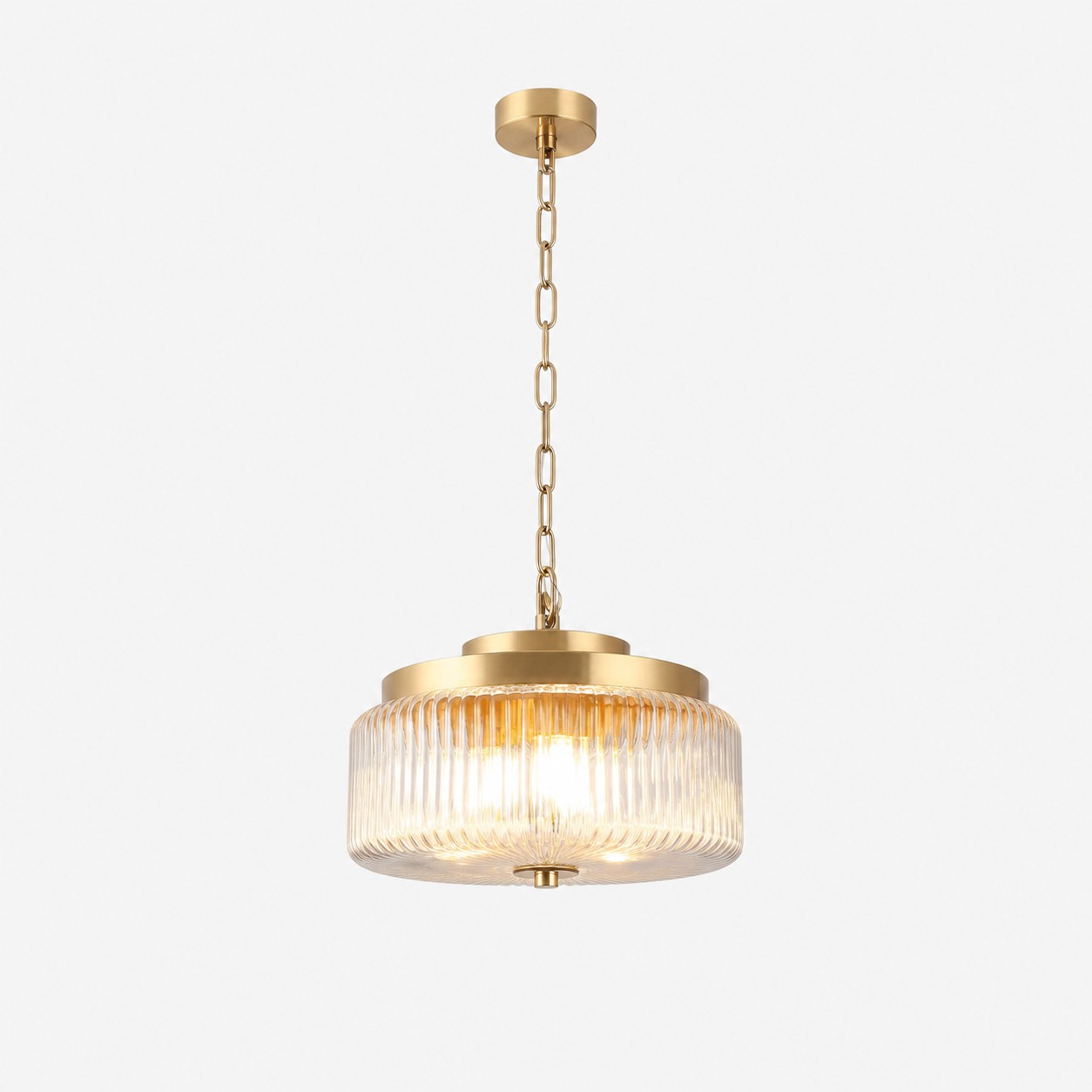 Pendant style ribbed glass light with antique brass metal frame