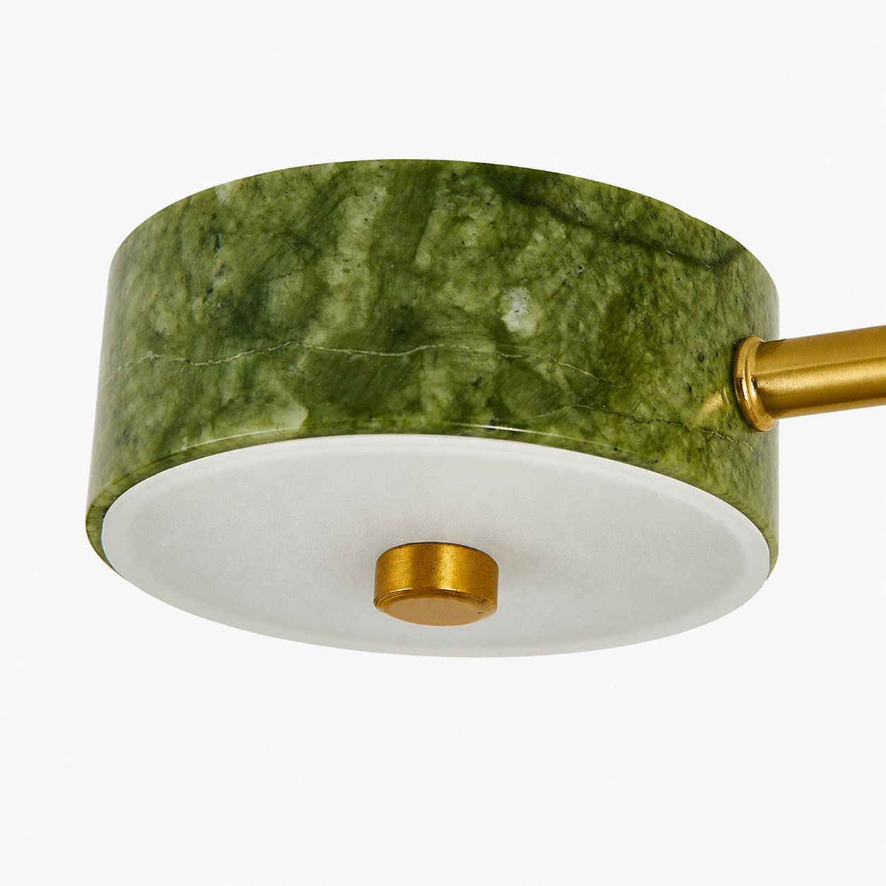 Close-up of the mottled green shade texture and metal arm