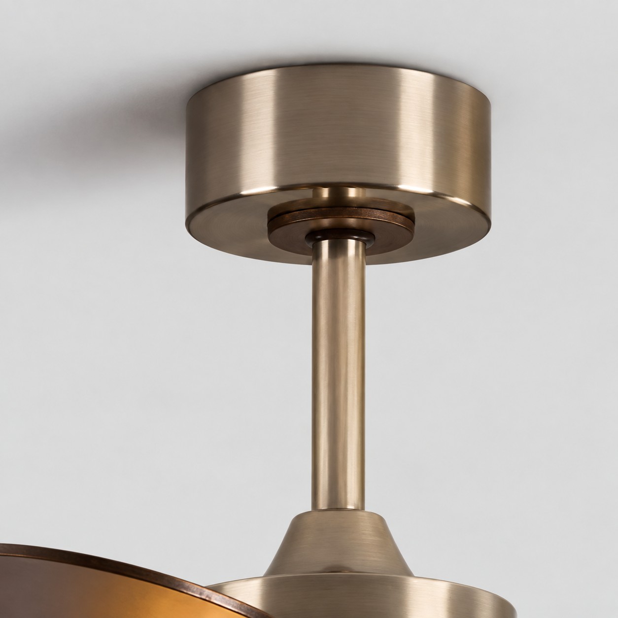Brushed gold canopy adds a refined luxe finish