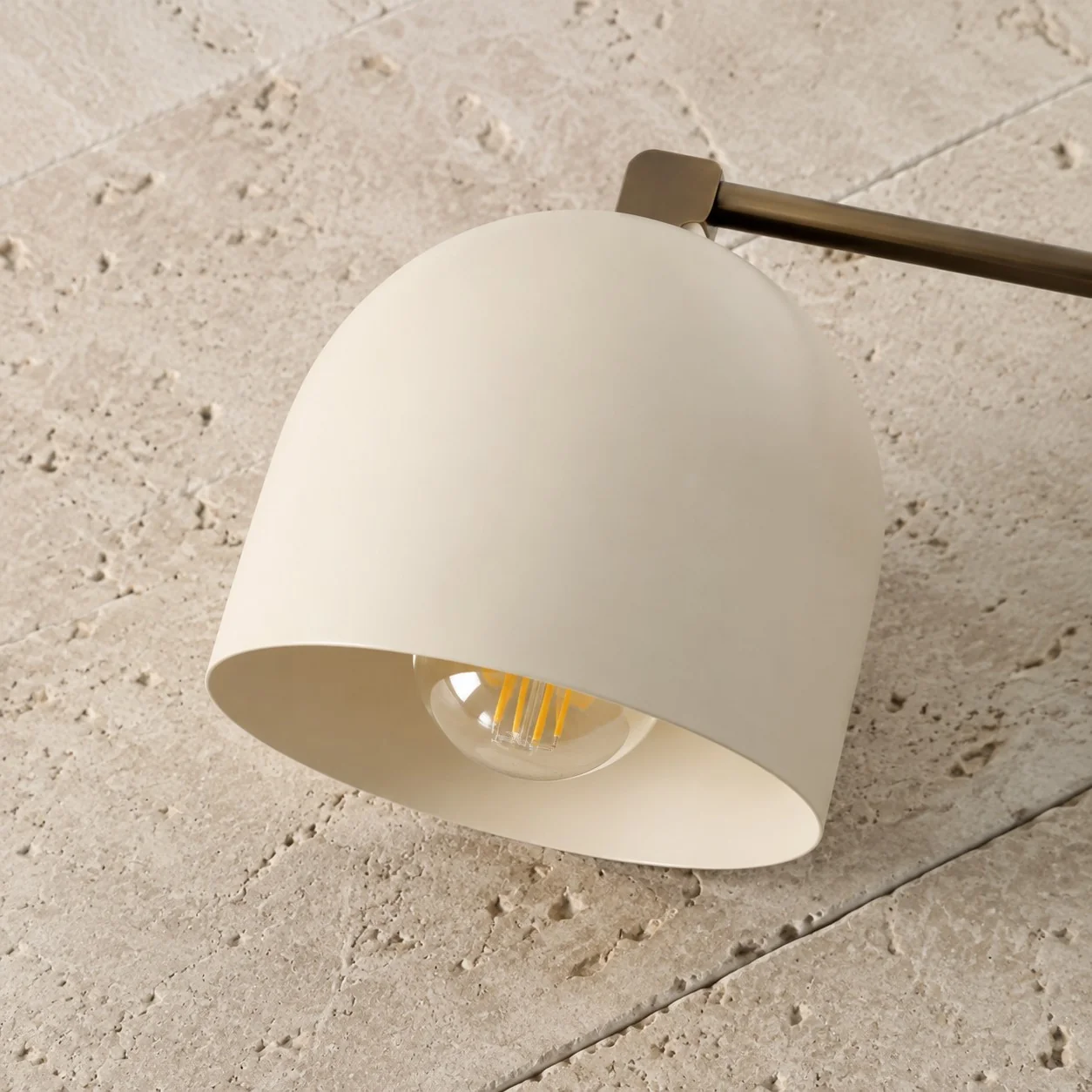 Open metal dome shade with the bulb visible underneath