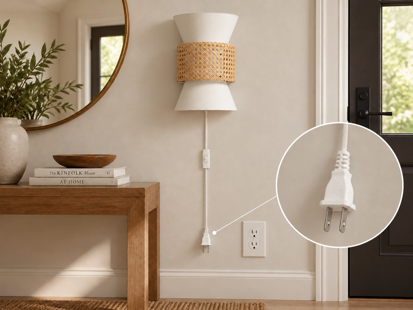 Plug-in rattan wall light beside a bed, with a white cord and plug