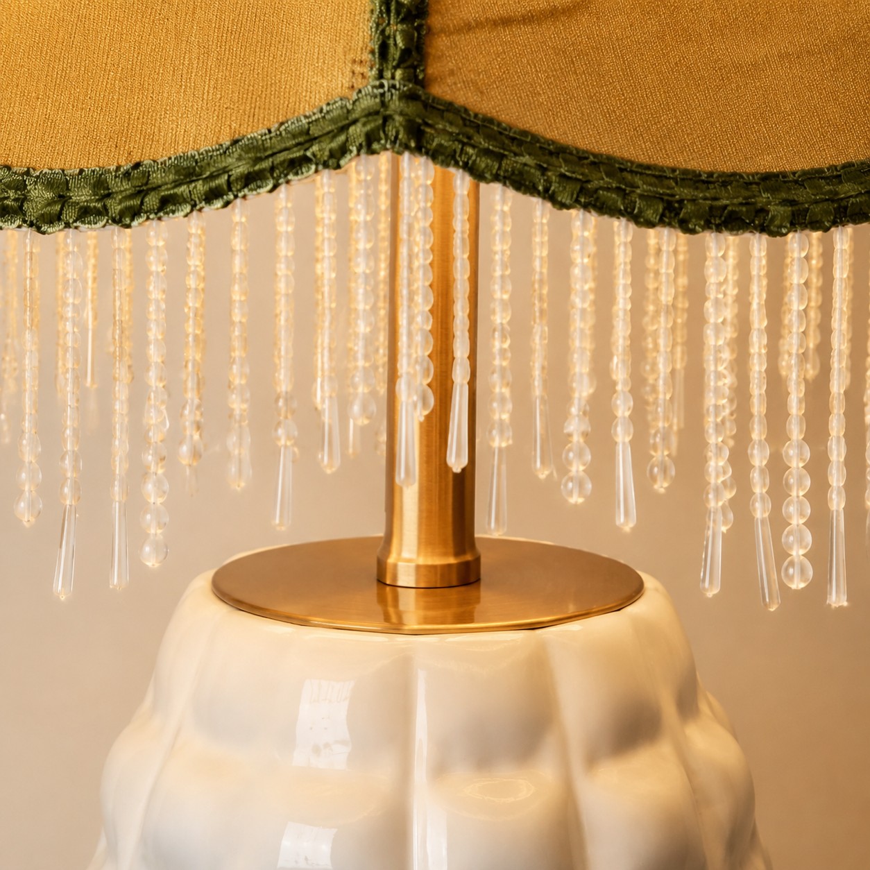 Close-up of chinoiserie fabric shade and beaded fringe