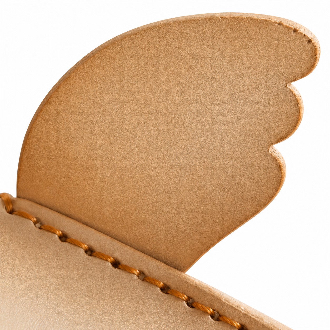 Vegetable-tanned leather and hand stitching detail