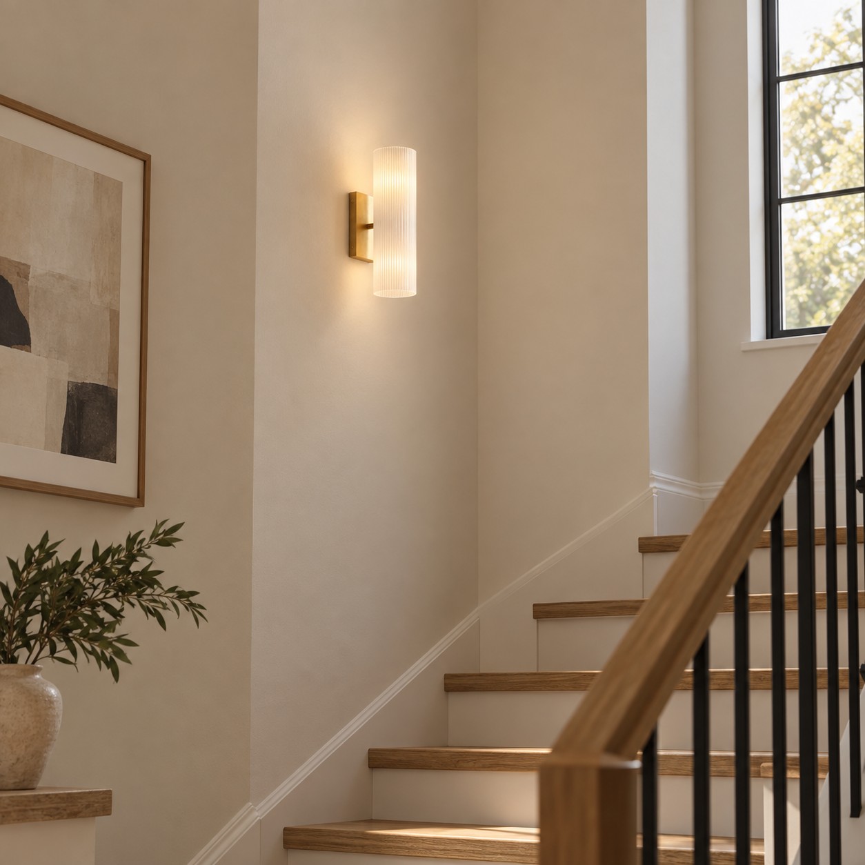Doran tube sconce on stair landing