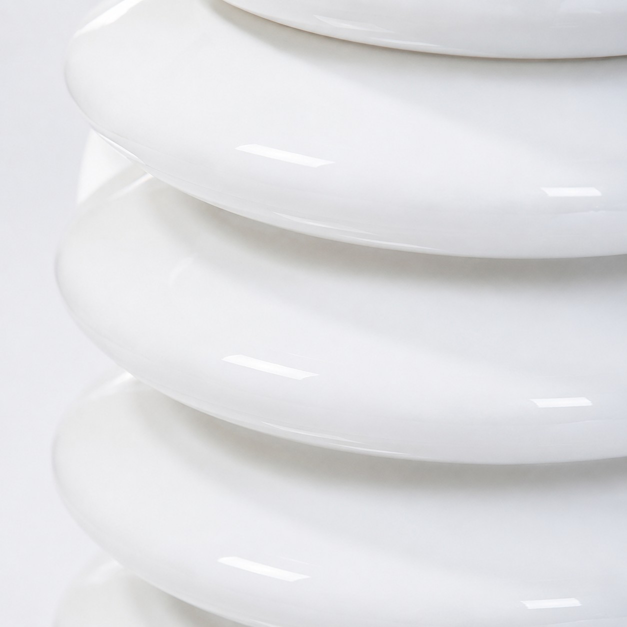 Close view of the ribbed glass pendant and chrome hardware