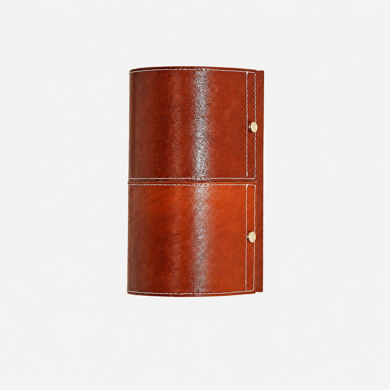 Brown leather wrapped cylinder wall sconce on a clean background