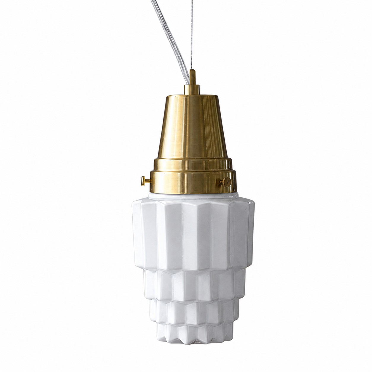 Milk glass shade detail on brass pendant light