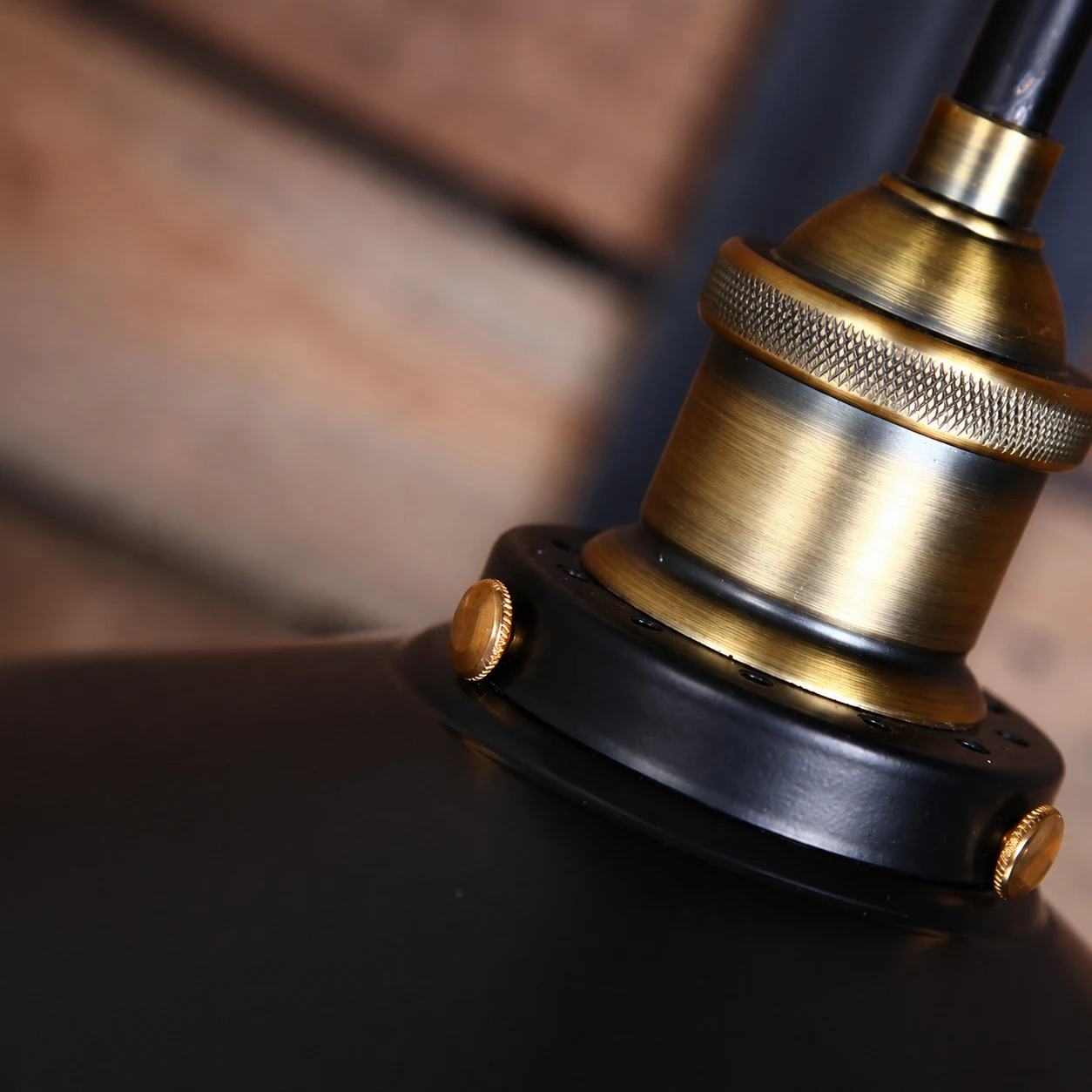 Dark bronze lamp holder and metal cap detail