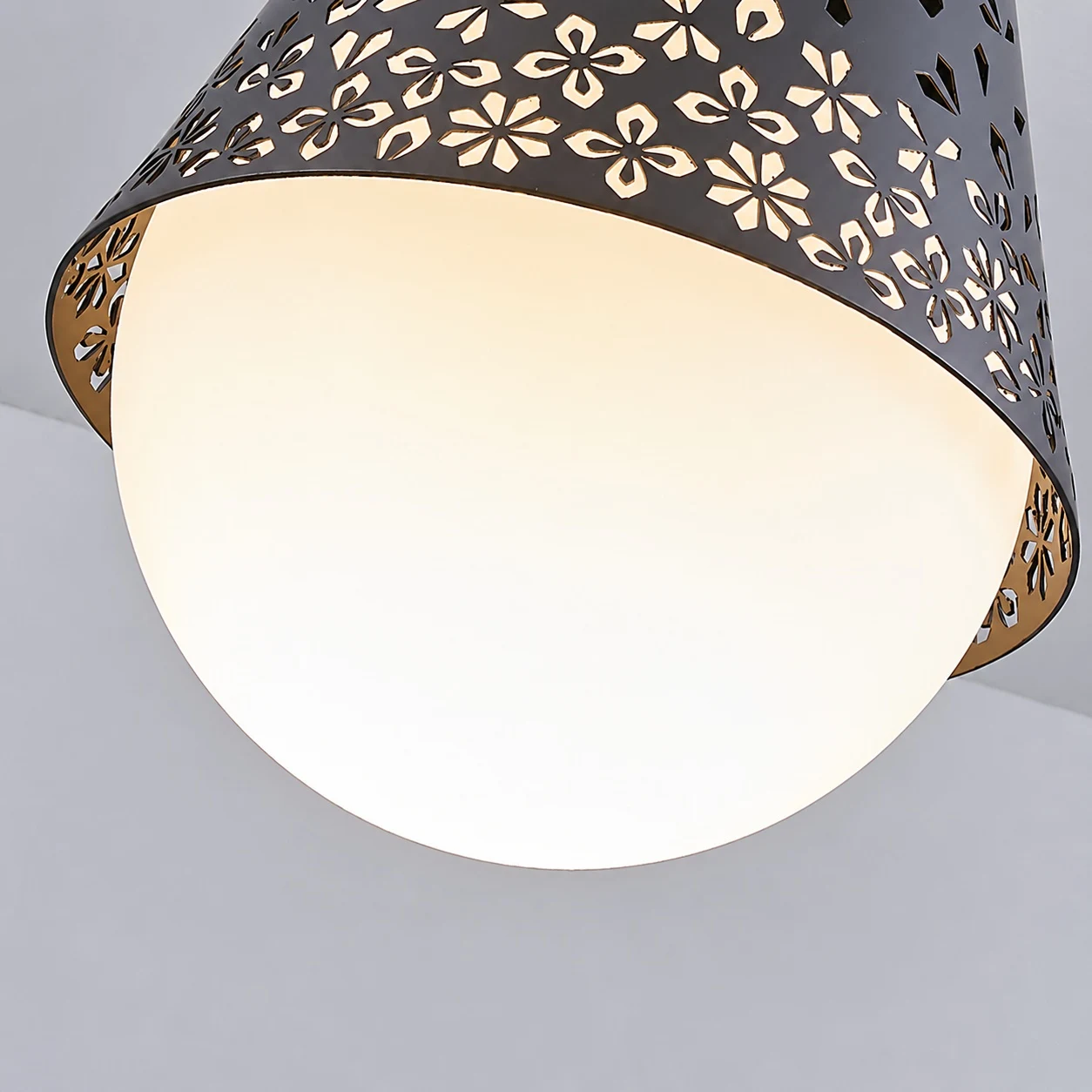 Baoxela glowing white glass diffuser and perforated metal rim detail