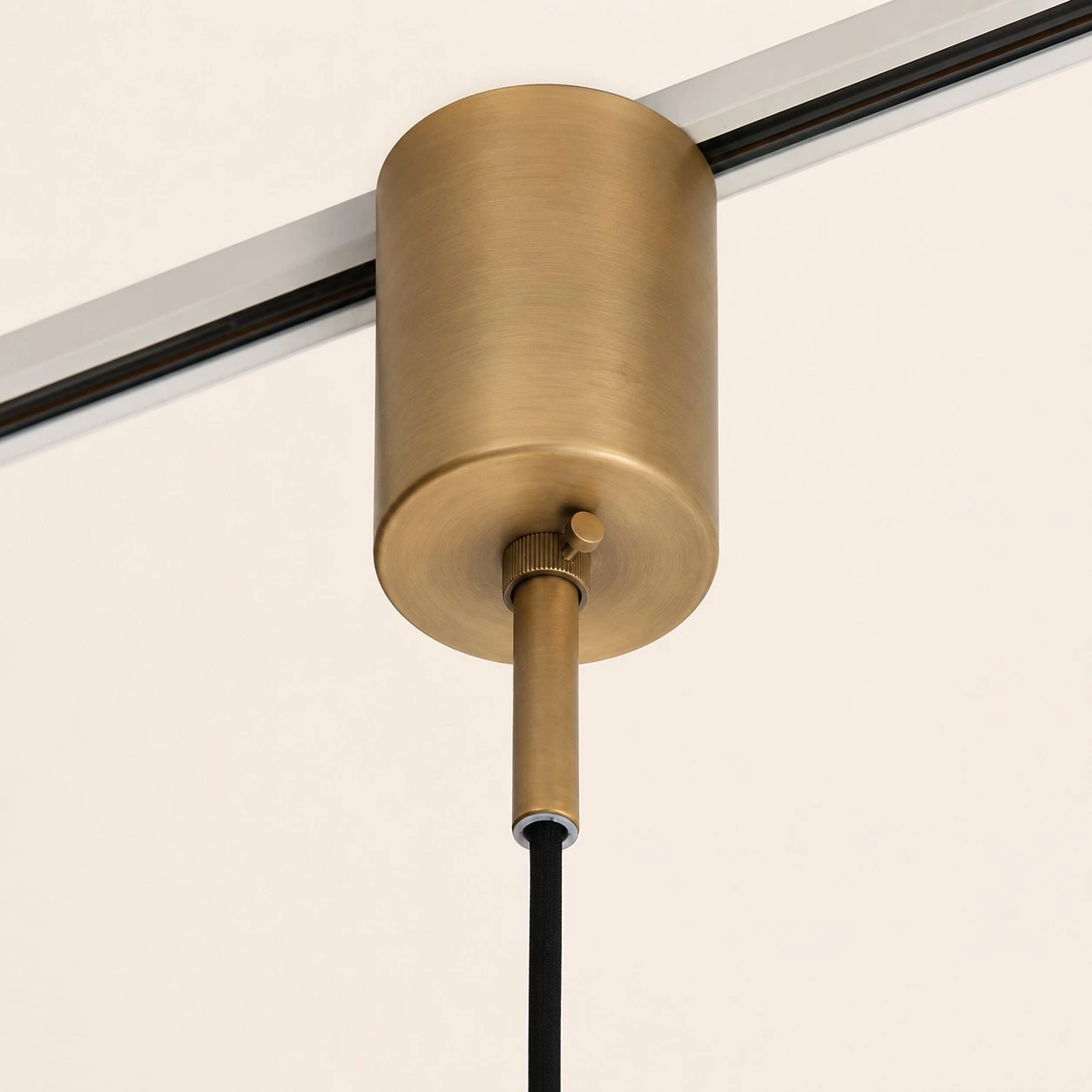 Pendant light close-up showing clear shade and visible bulb form