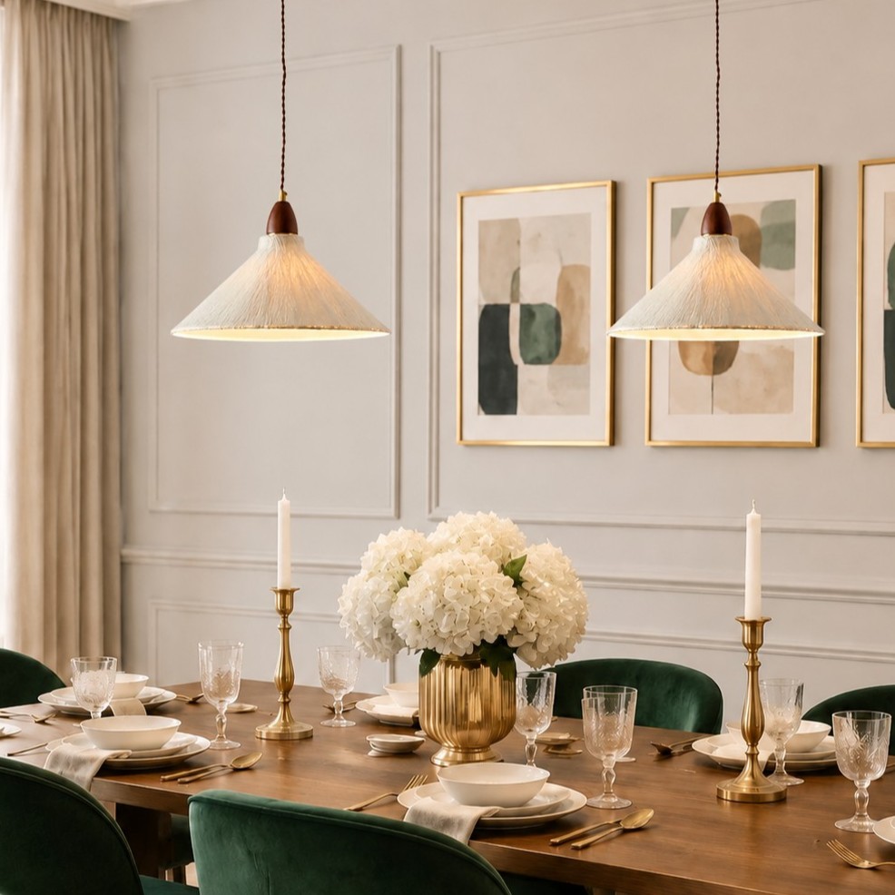 Conical rice paper pendant lights above a dining table