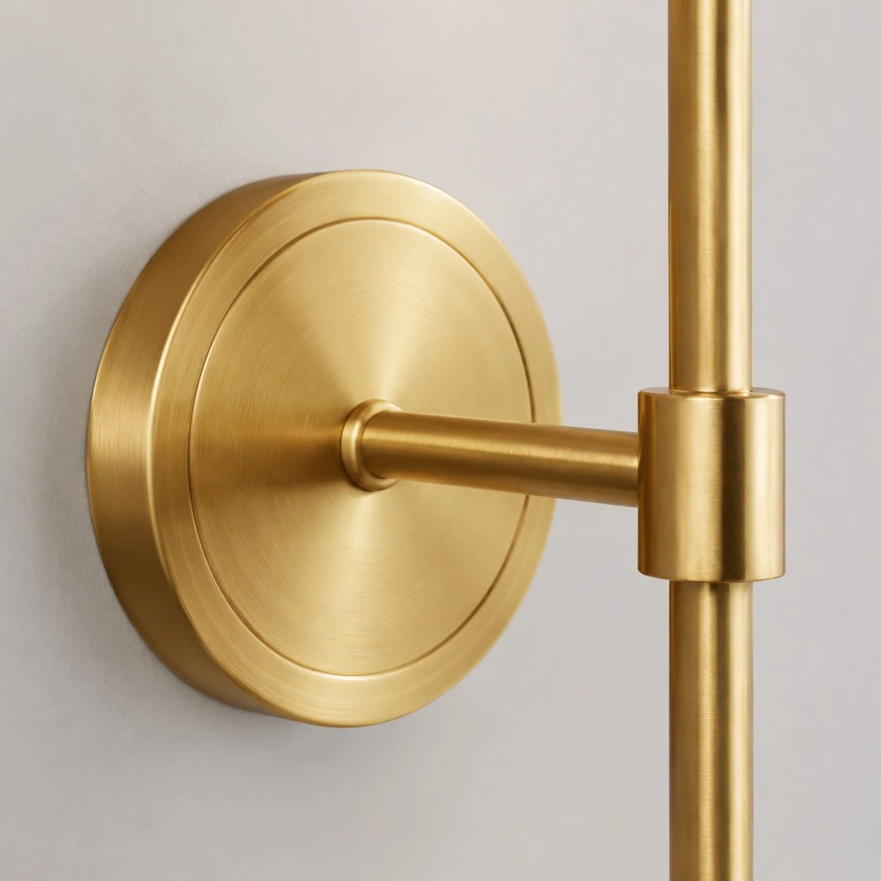 Brass wall plate and arm detail