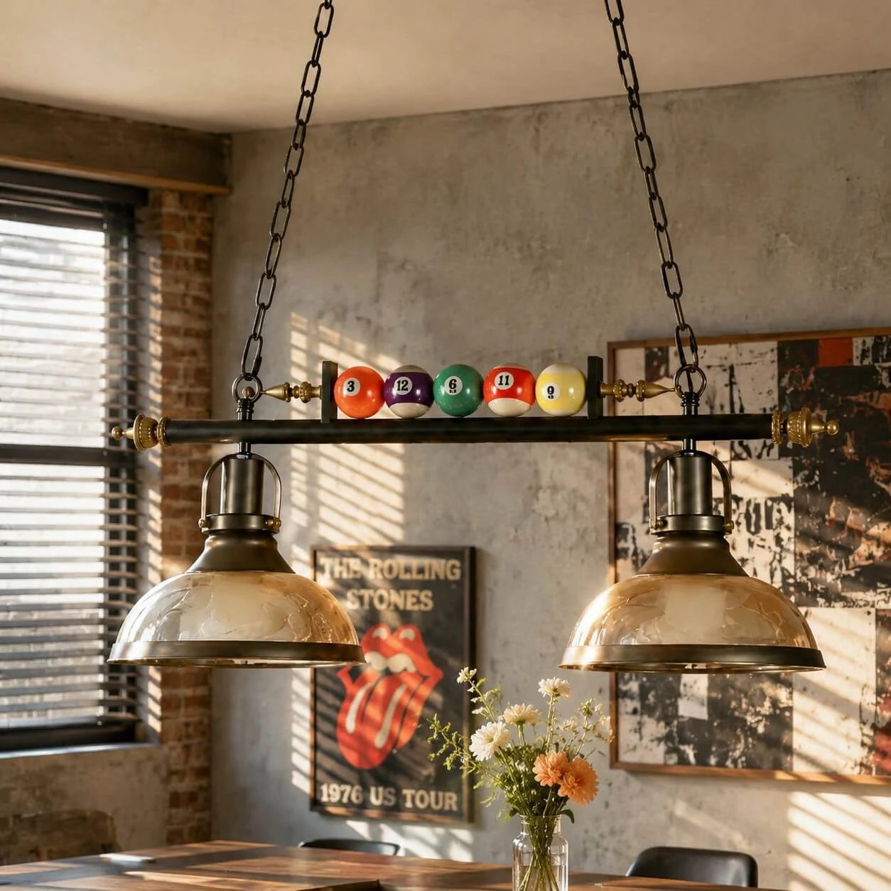 Two amber glass shades over a billiard table in an industrial room