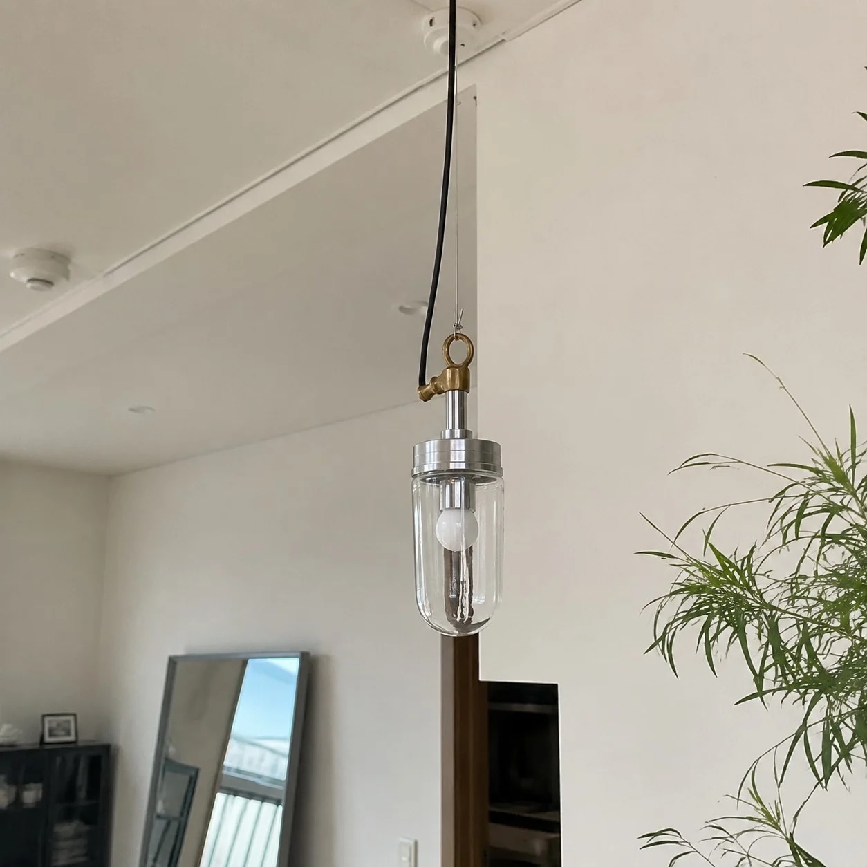 Pendant lamp in a living room corner