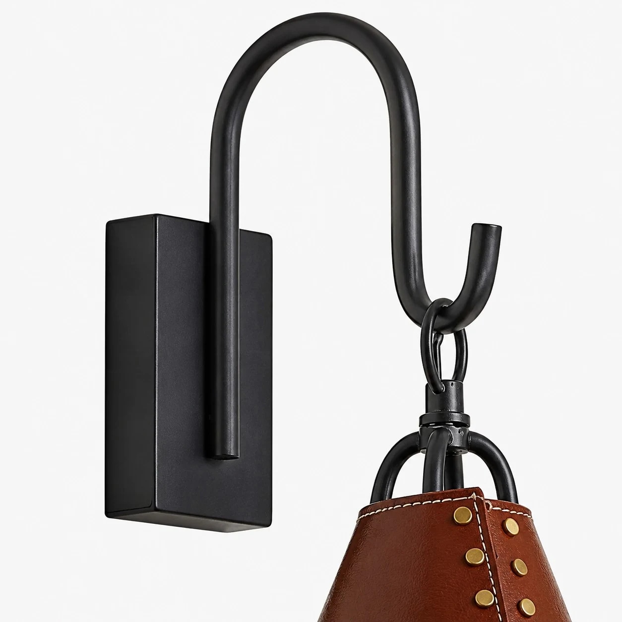 Close view of black hook and wall plate