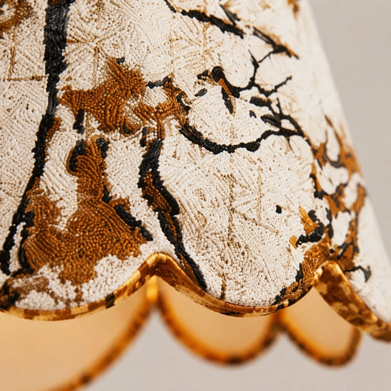 Textured fabric, scalloped by design.