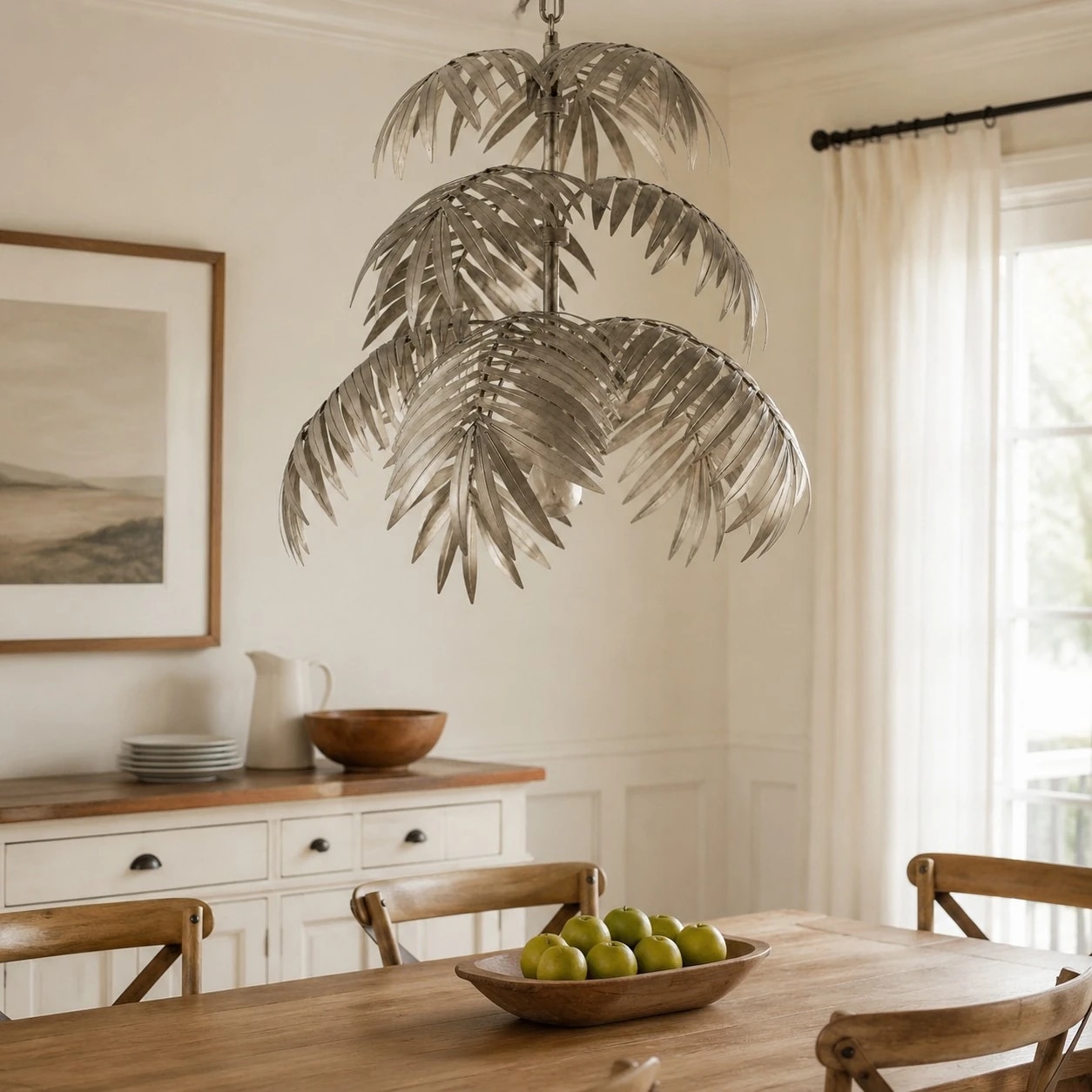 Silver palm leaf chandelier in a dining room
