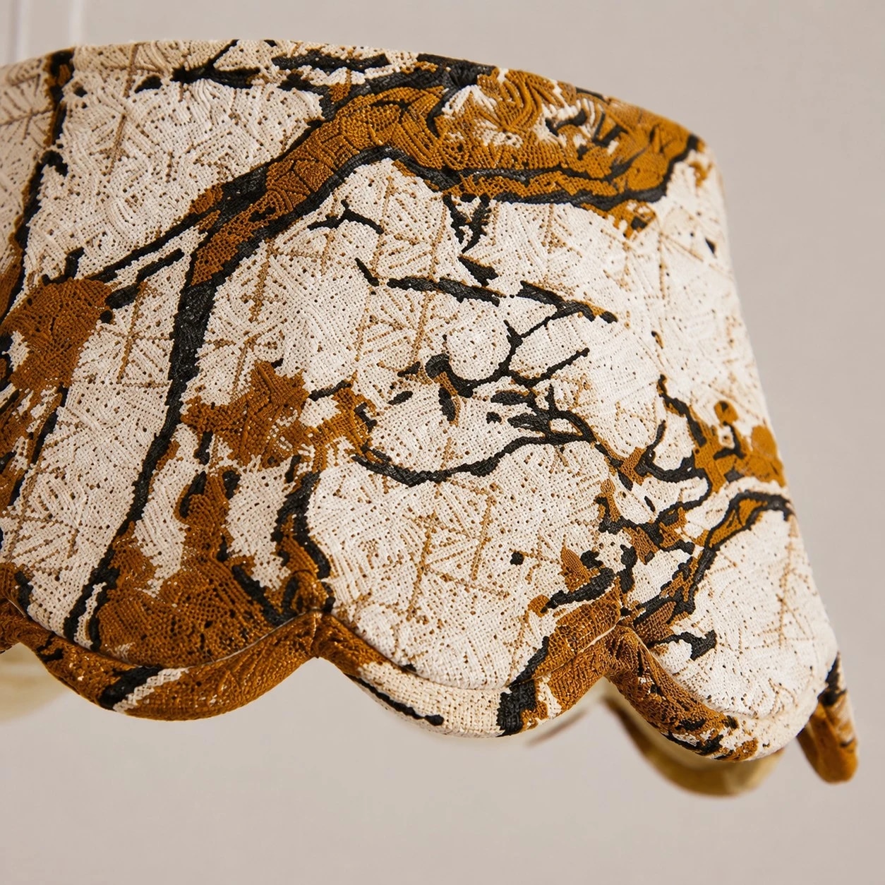 Textured fabric, scalloped by design.