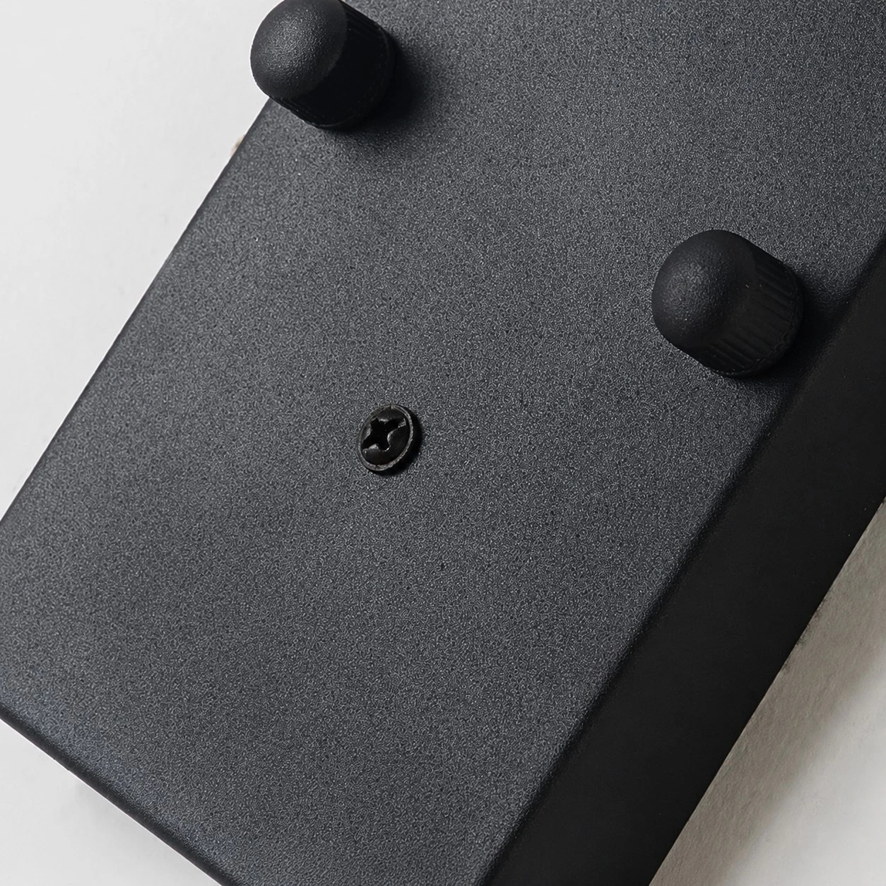 Matte black wall plate close detail