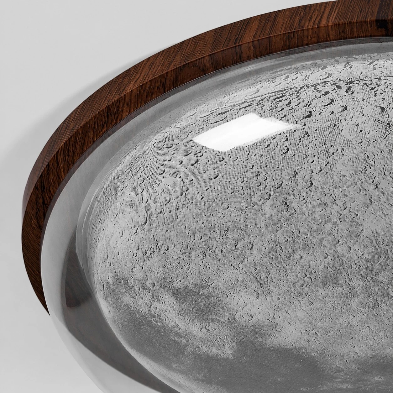 Close detail of moon-textured diffuser