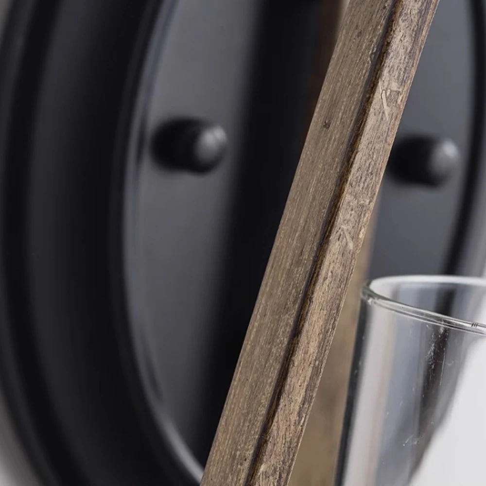Close view of rust finish texture and black wall plate