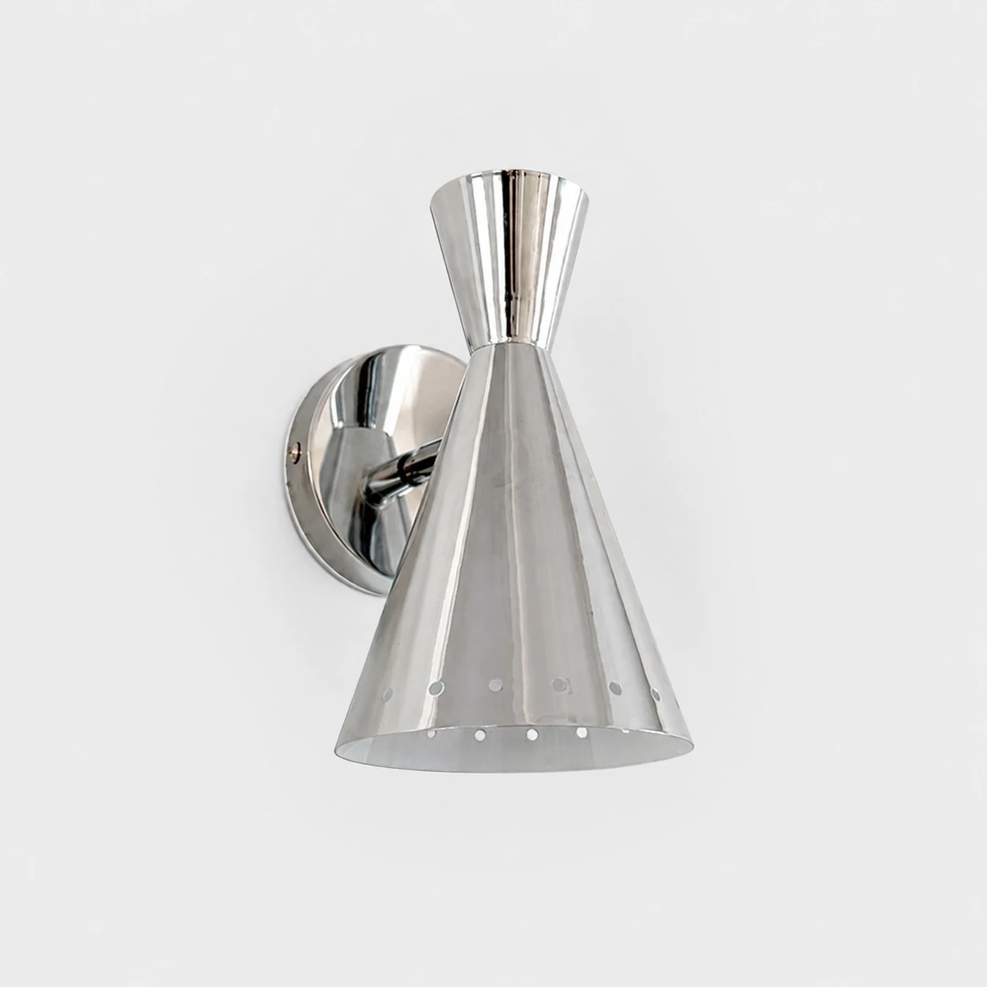 Polished cone wall sconce on a clean background
