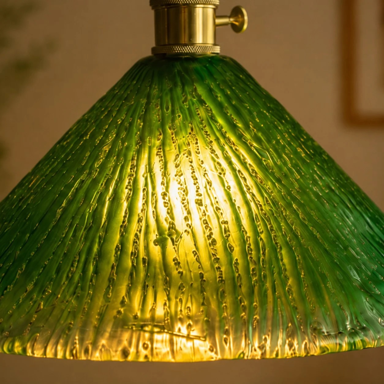 Green ribbed glass shade glowing