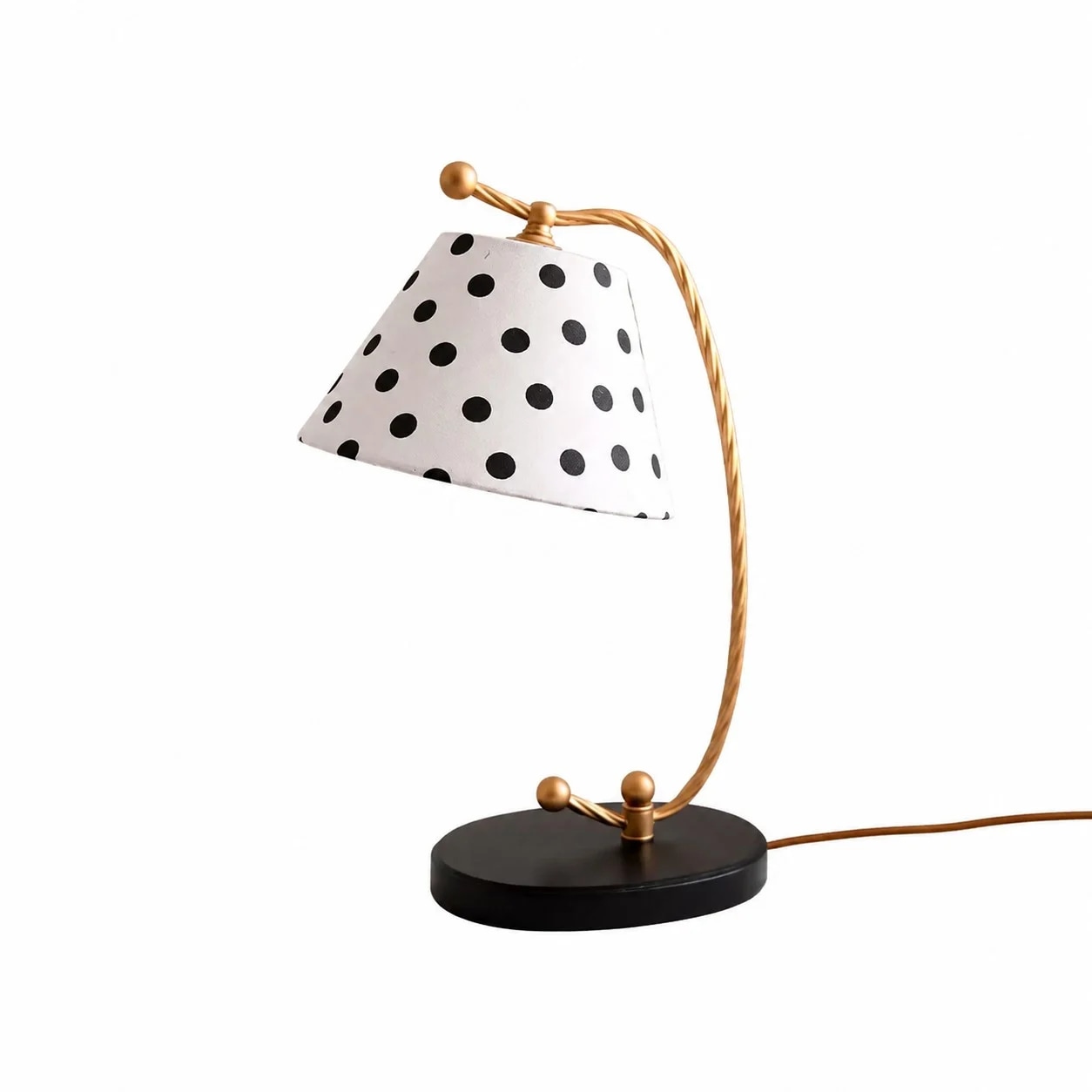 Vue complète de la lampe de table à pois noirs et blancs