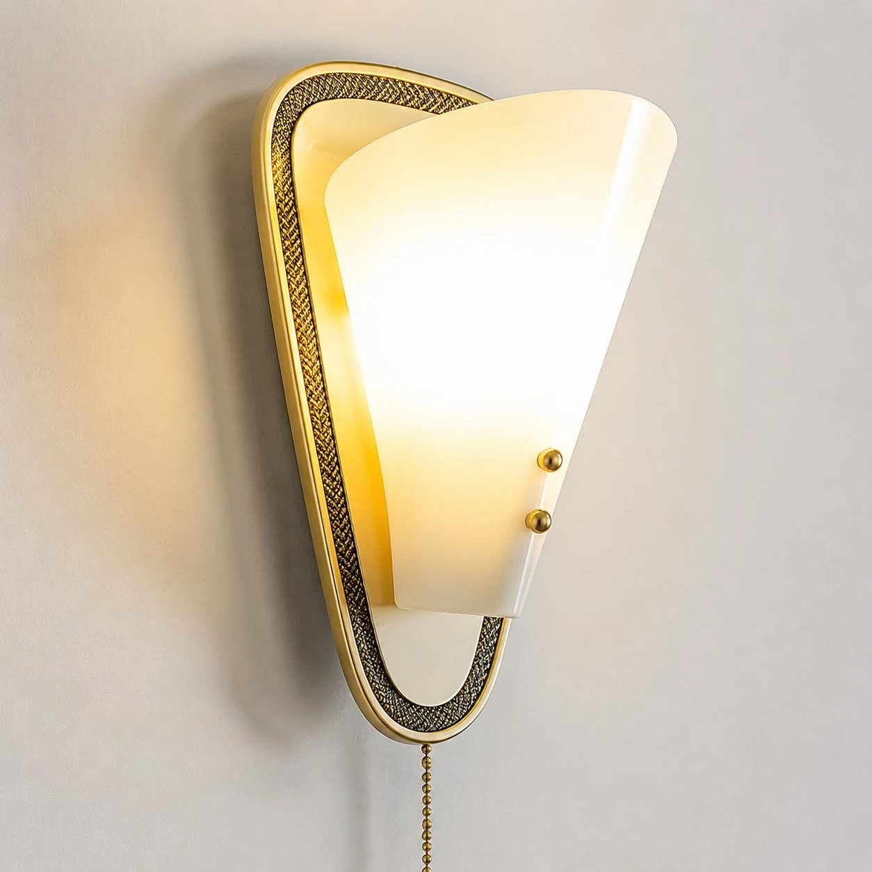 Vintage wall sconce lit on the wall