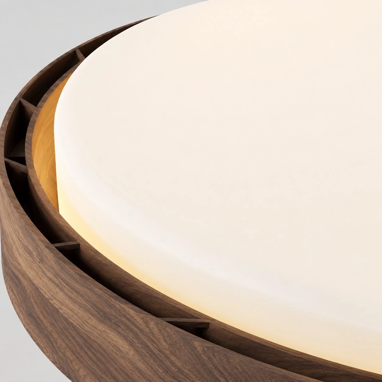 Walnut rim and smooth diffuser detail on flush ceiling fan light