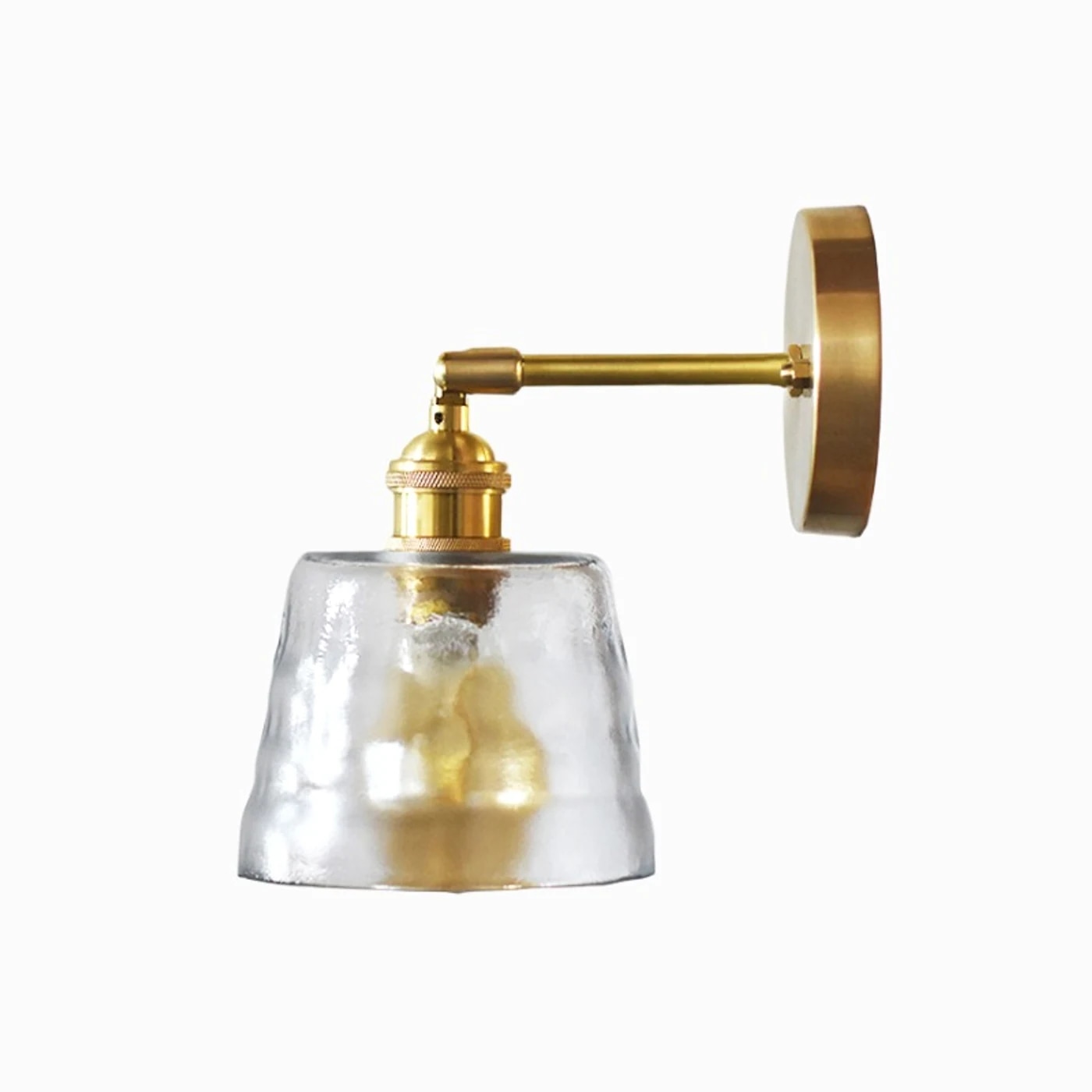 enkel vägglampa i mässing och klart glas