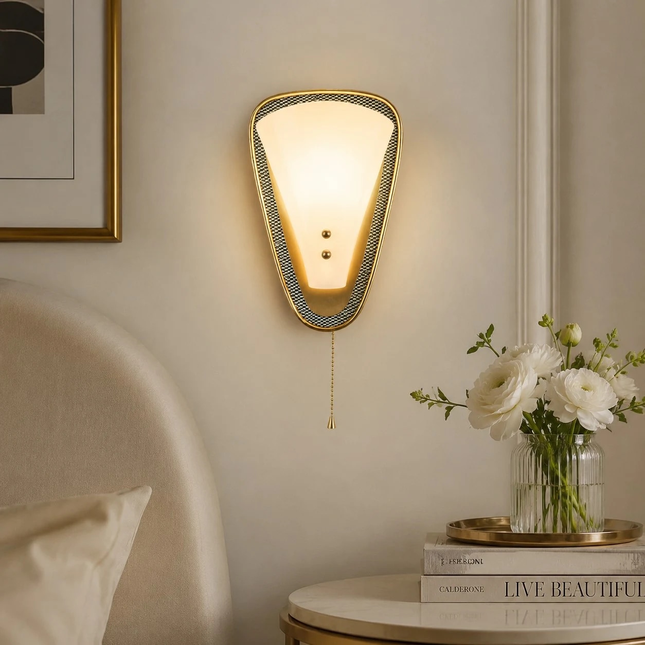 Wall sconce beside a bedroom table