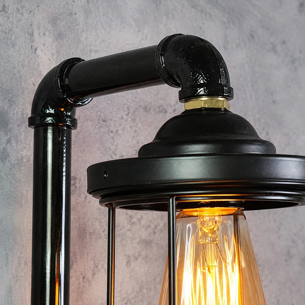 Industrial Pipe Wall Sconce with Vintage Cage Shade close-up