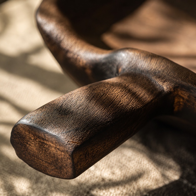 Short solid wood handle with visible grain