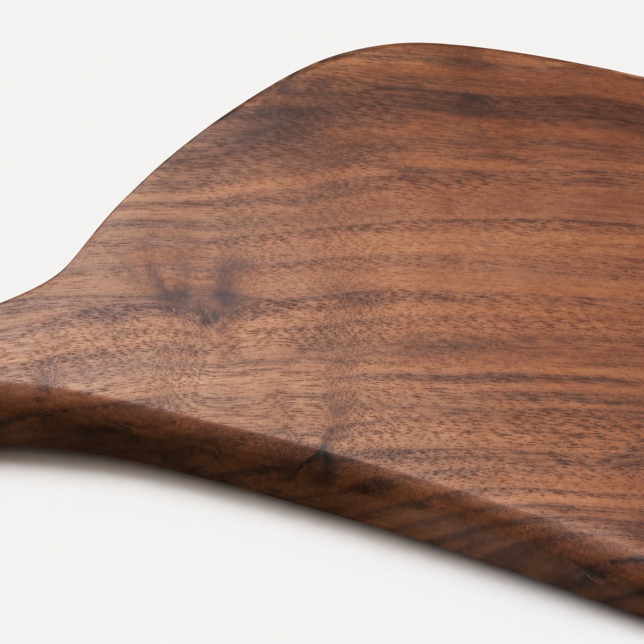 Black walnut grain and rounded board edge