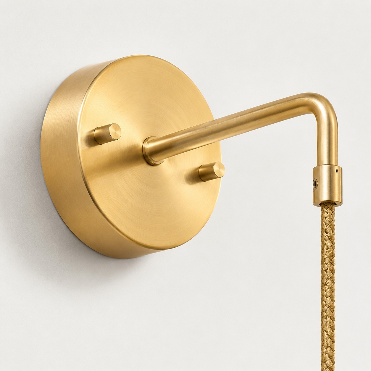 Compact wall plate: A round wall base keeps installation clean and visually simple.