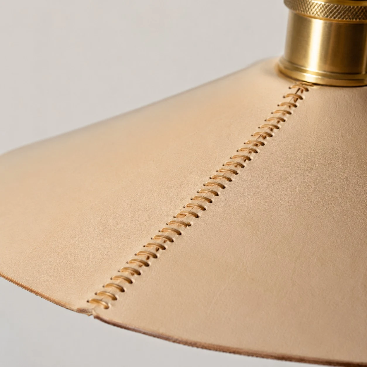 Hand-stitched leather-look pendant shade edge