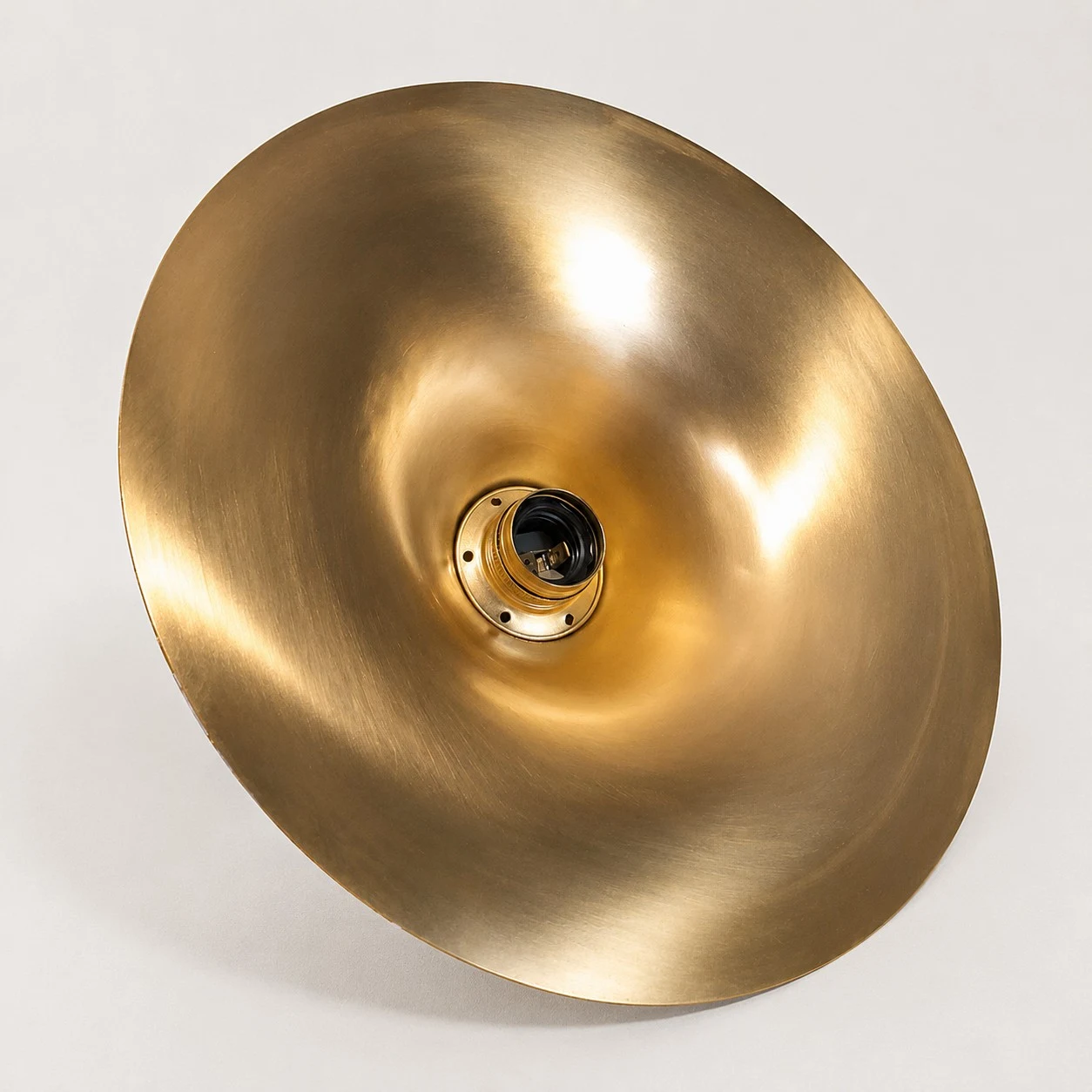 Underside view of the brass shade and socket assembly