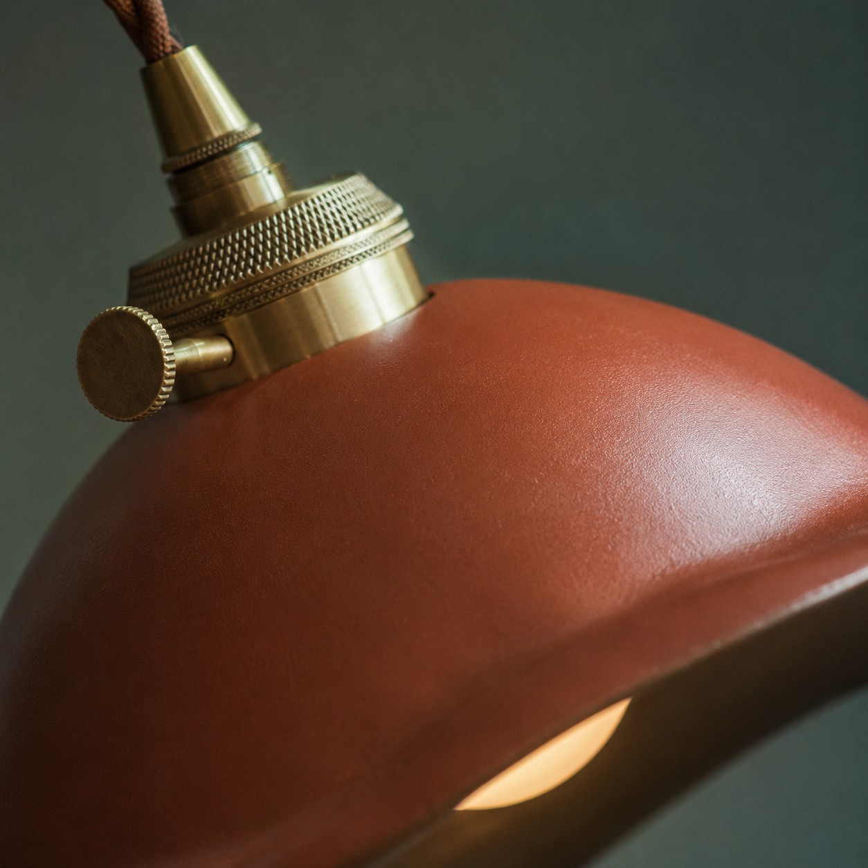 Dual-glaze ceramic pendant light shown from the front