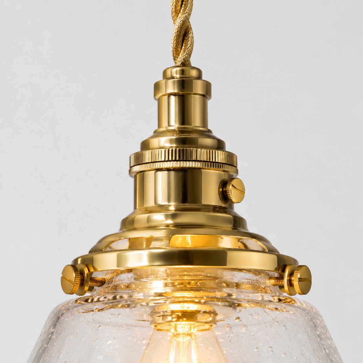 Bubble glass pendant brass hardware close-up