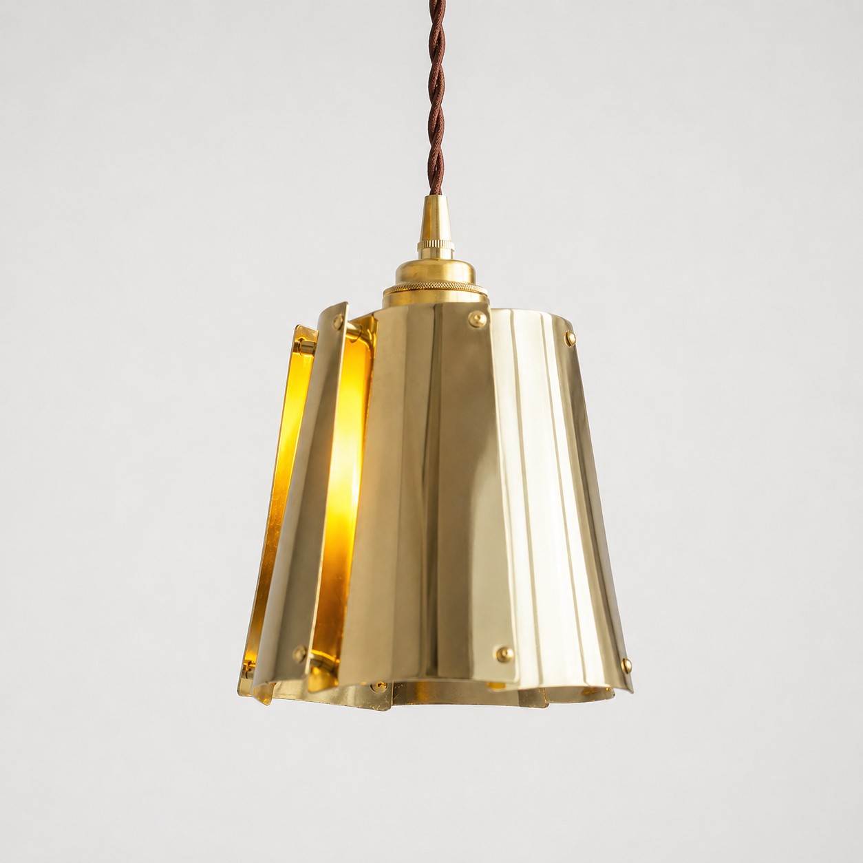 Brass layered pendant light structure detail