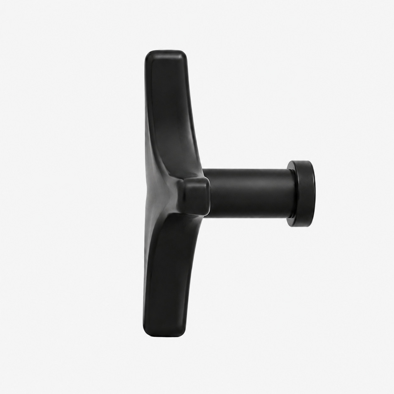 Side detail of black metal starburst cabinet knob