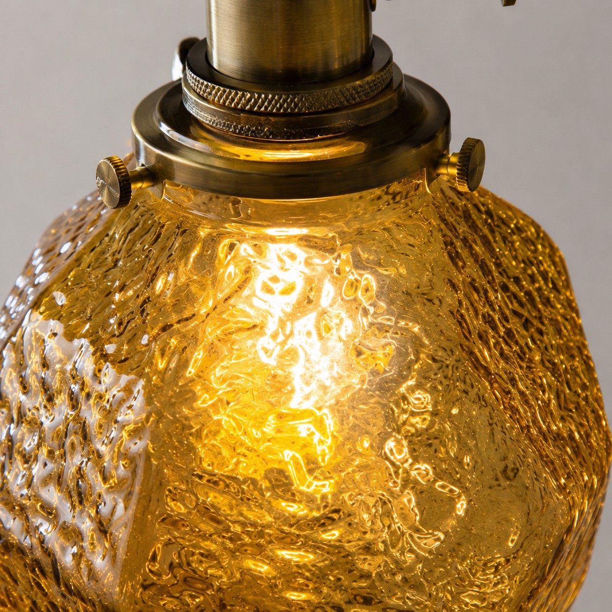 Irregular textured glass gives every angle a sculptural presence.