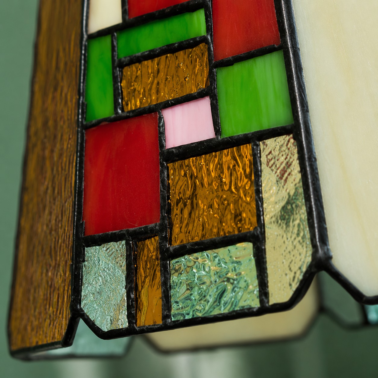 Detailed view of the colored glass pattern and dark joining lines
