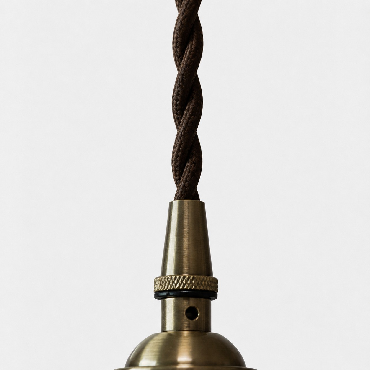 A twisted cord completes the understated vintage character.