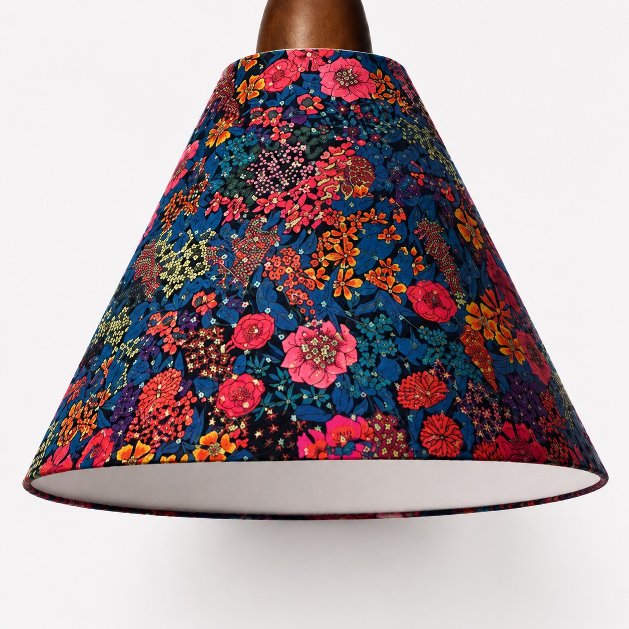 Close-up of dense botanical Liberty fabric texture and finished shade edge