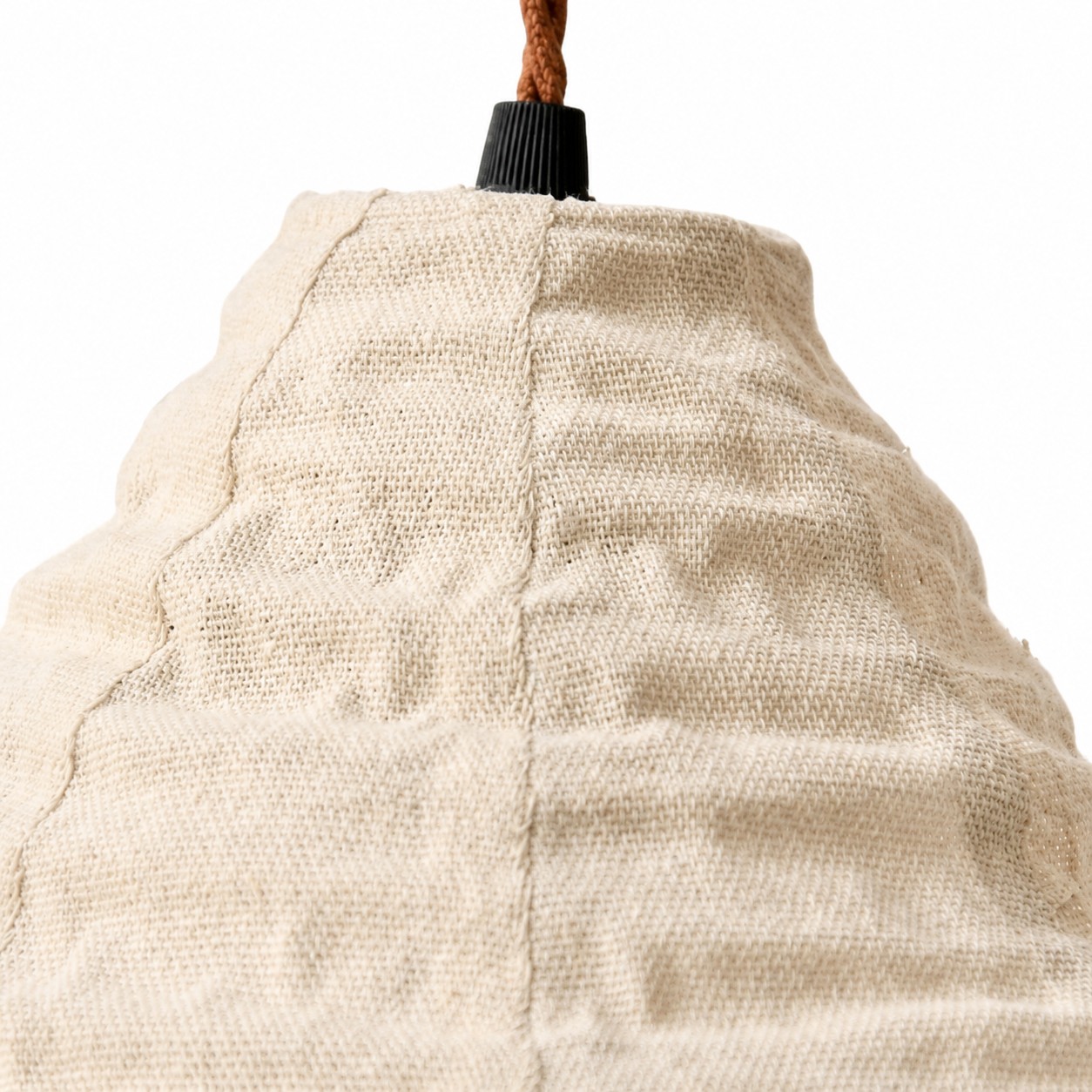 Upper shade close-up showing fabric weave and suspension detail