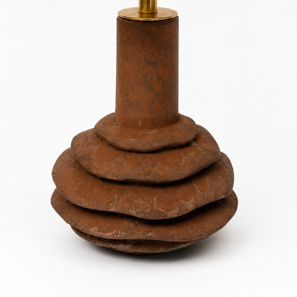 Tiered textured ceramic table lamp base detail