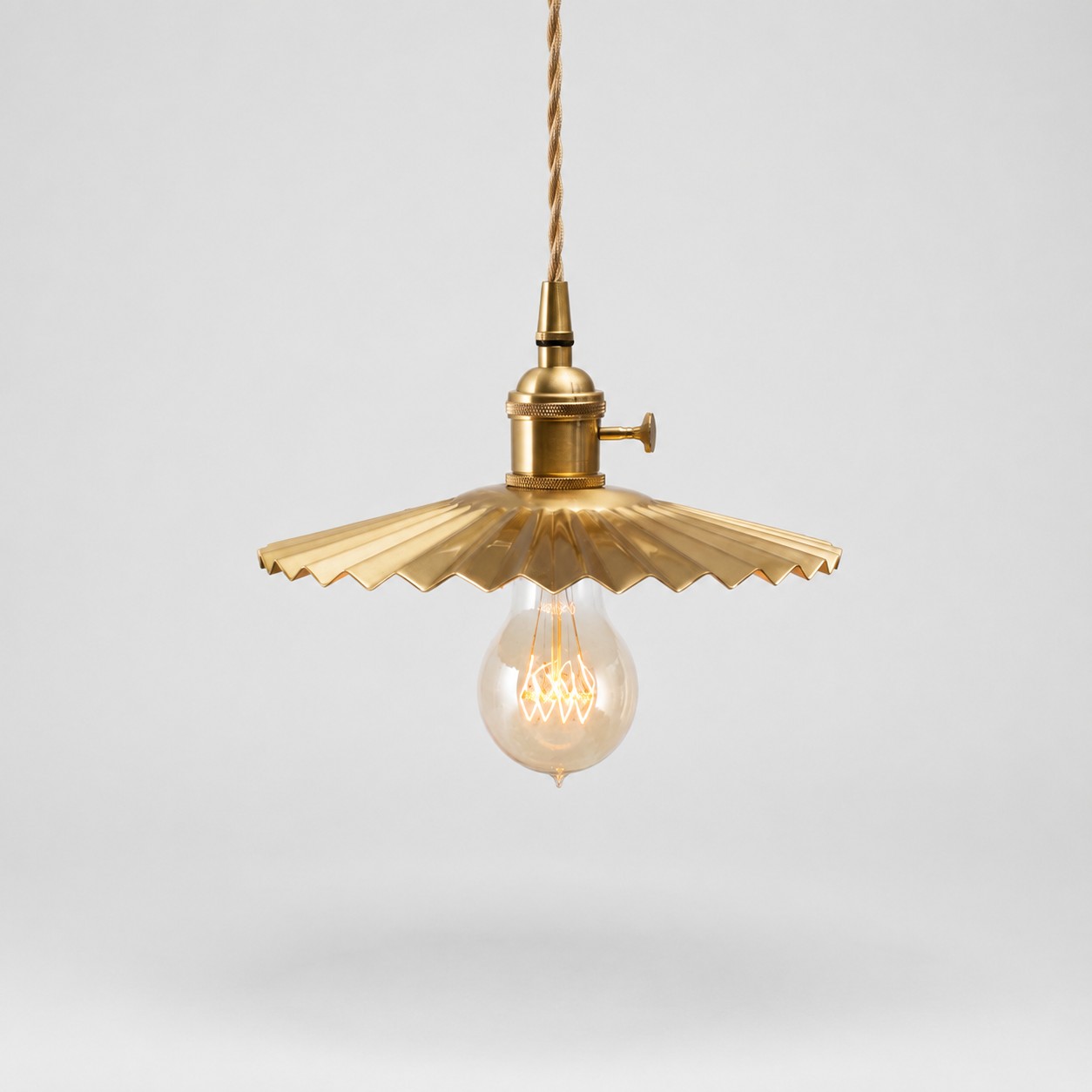 Single pleated brass pendant light