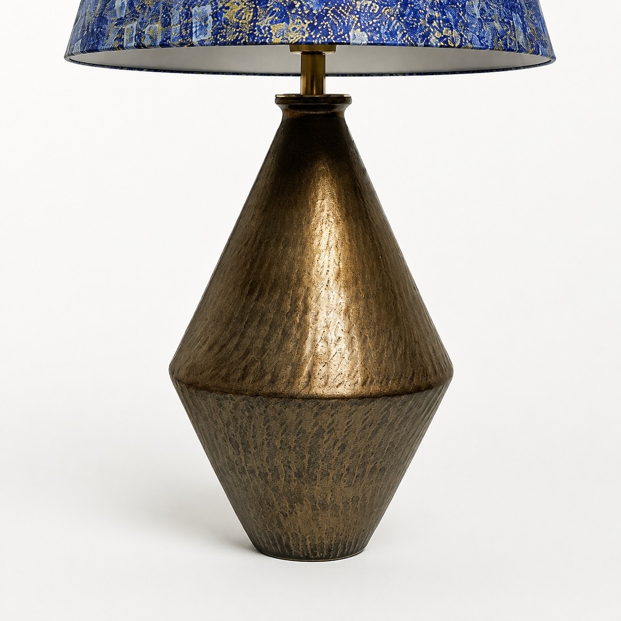 Textured gilt ceramic table lamp base detail